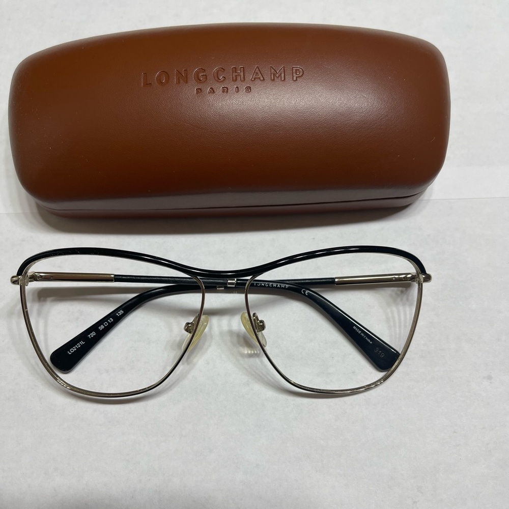 Worn Longchamp Eyeglasses.